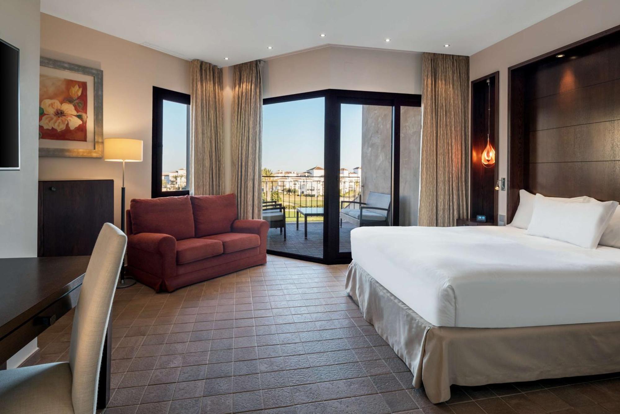 拉托雷希尔顿逸林高尔夫水疗度假酒店 罗尔丹 外观 照片 A room at the hotel